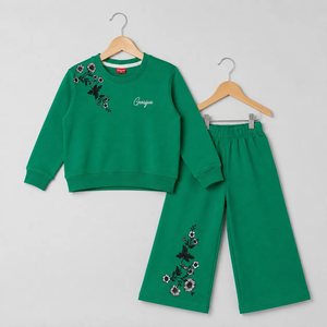 Terry green floral print tracksuit for girls, featuring a cozy sweatshirt and matching wide-leg pants.