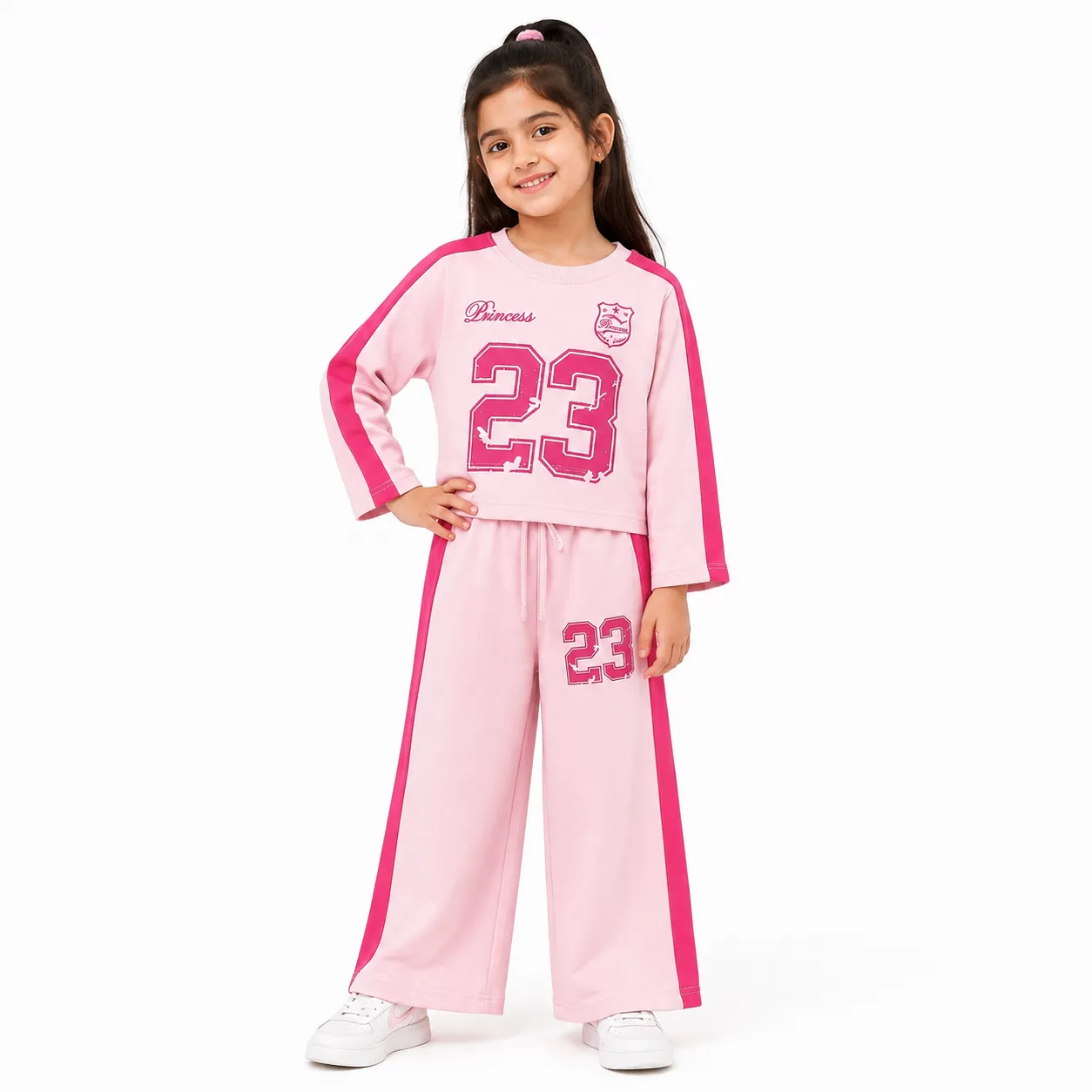 Terry Pink Princess 23 Baggy Tracksuit for Girls featuring a cropped top and wide-leg pants. Comfy and stylish.